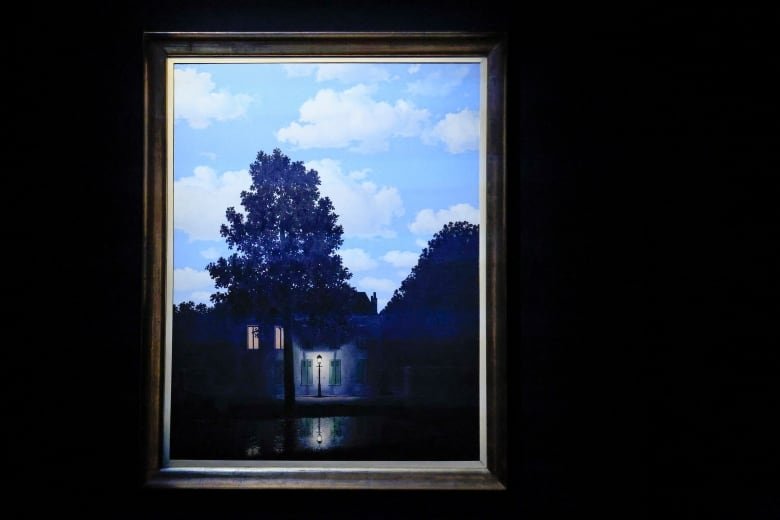 A painting of a house in darkness with a light on in the window and a lit lamppost outside it, and a light blue sky with white clouds above it.