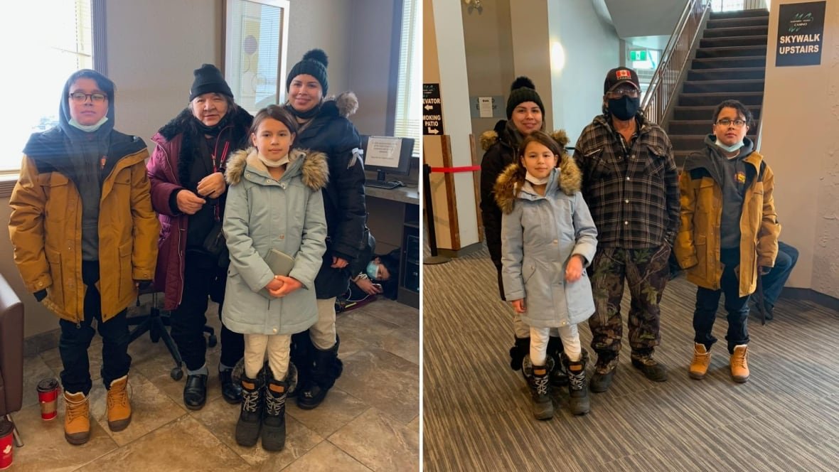 Family members wearing winter coats smile for the camera