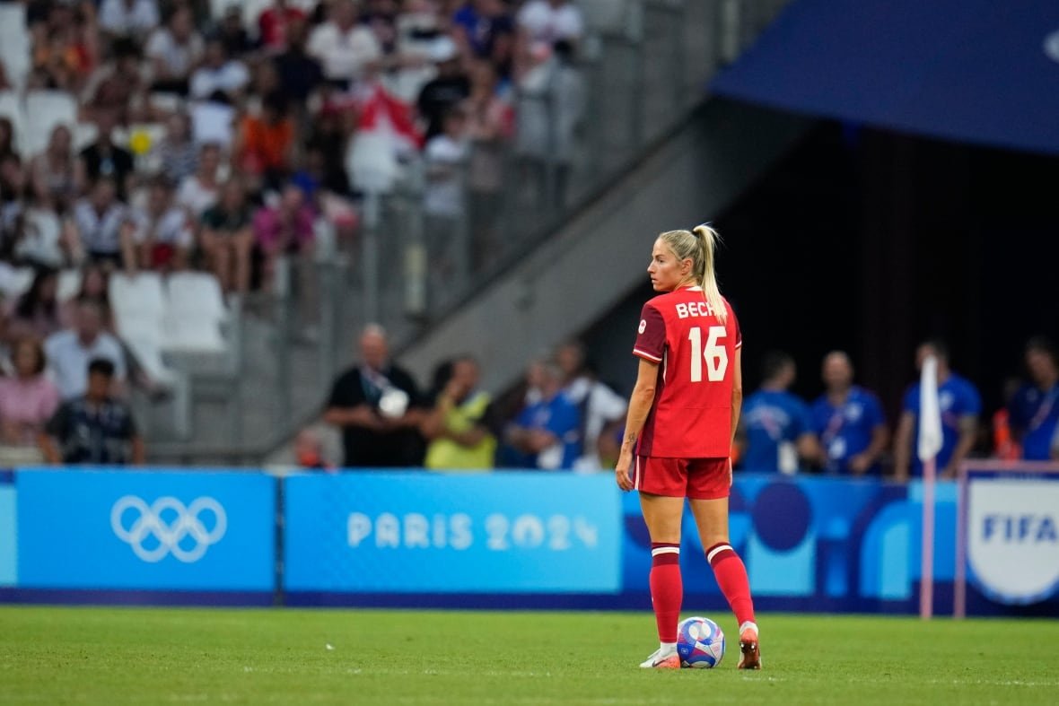 A soccer player on the pitch.